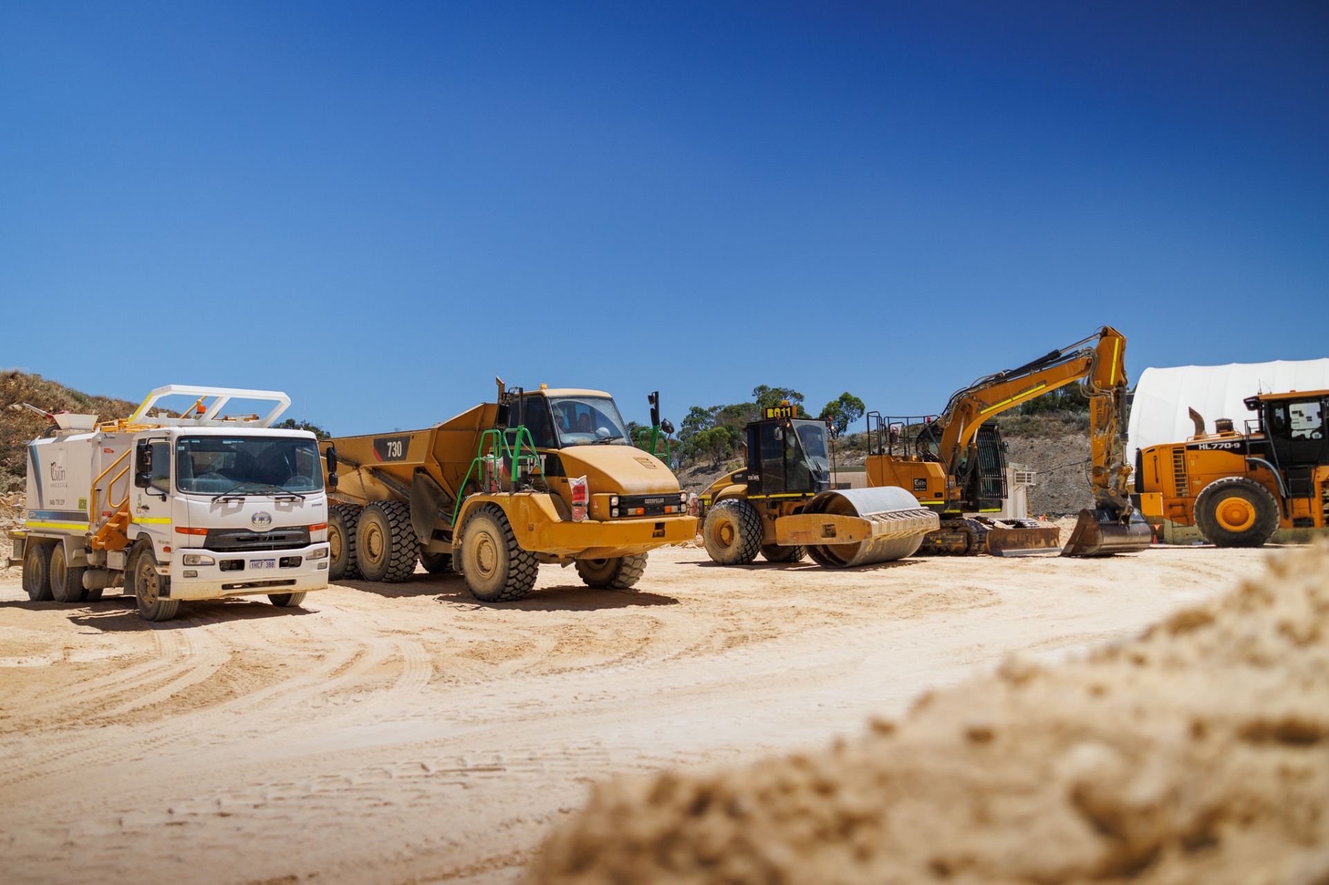 Mining training Perth — fleet of heavy machinery on live mine site