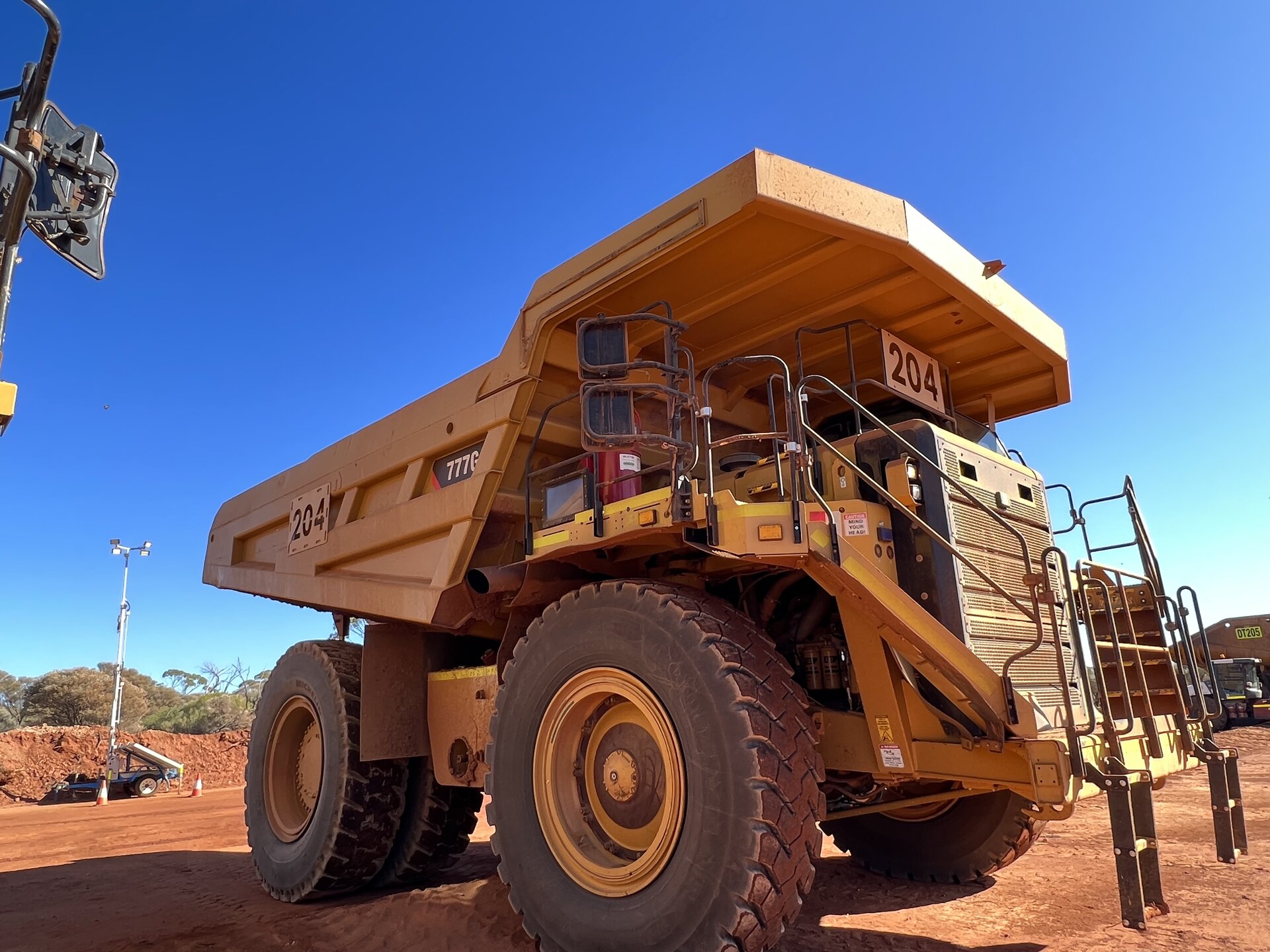 Rigid haul truck training on a live mine site